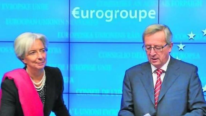 Lagarde y el presidente del Eurogrupo, Jean-Claude Juncker, en una comparecencia anterior.