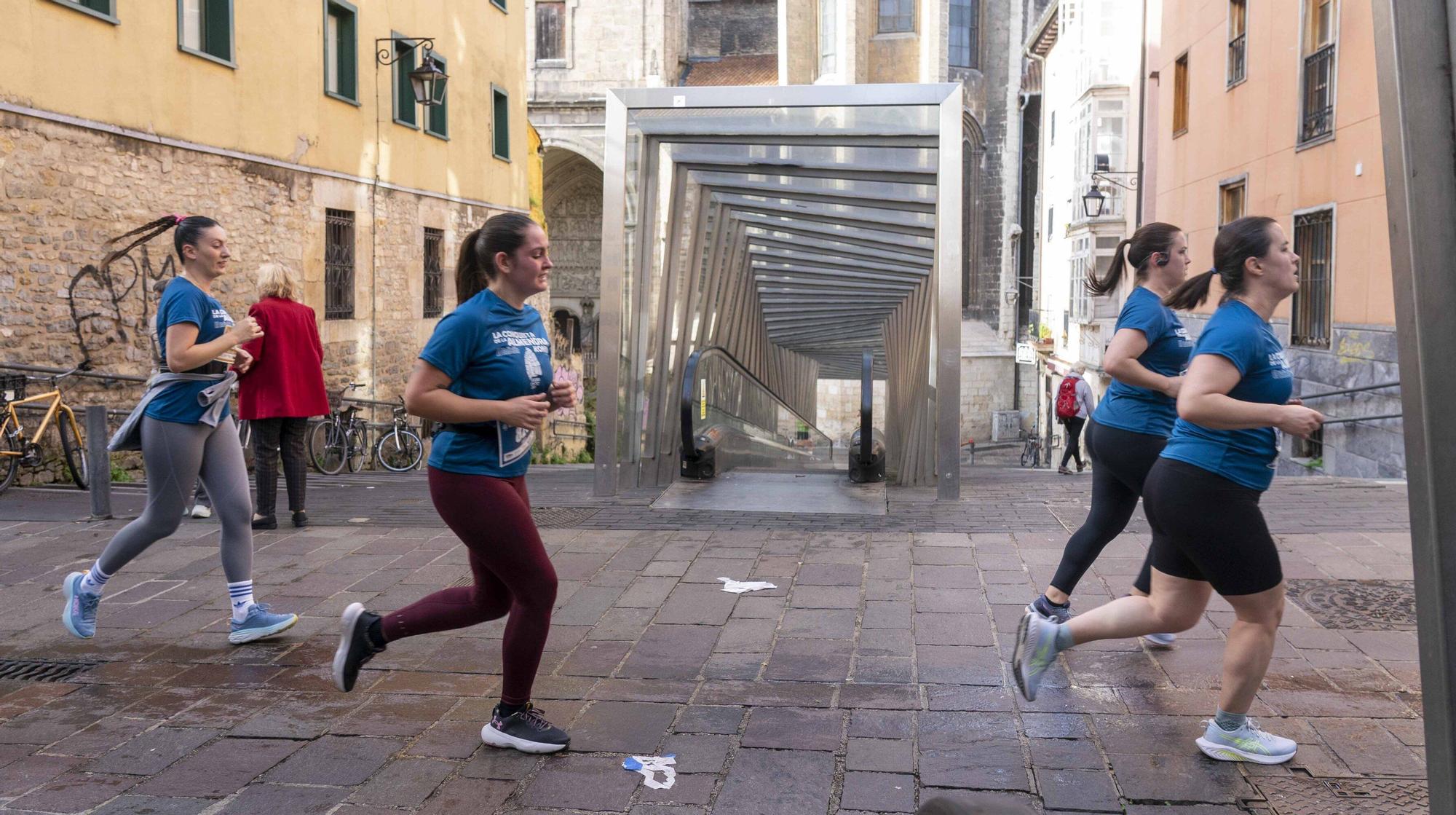 En imágenes: Un millar de corredores atraviesan la almendra