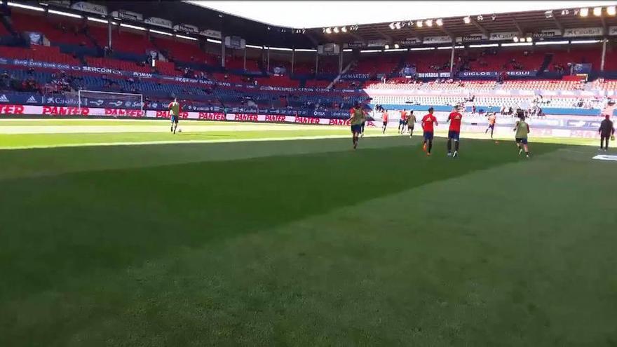 Jugadores calentando antes del partido.
