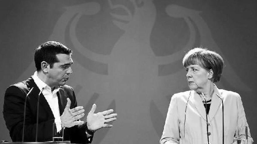 Merkel y Tsipras, durante la rueda de prensa celebrada después de su reunión en la sede de la Cancillería en Berlín.