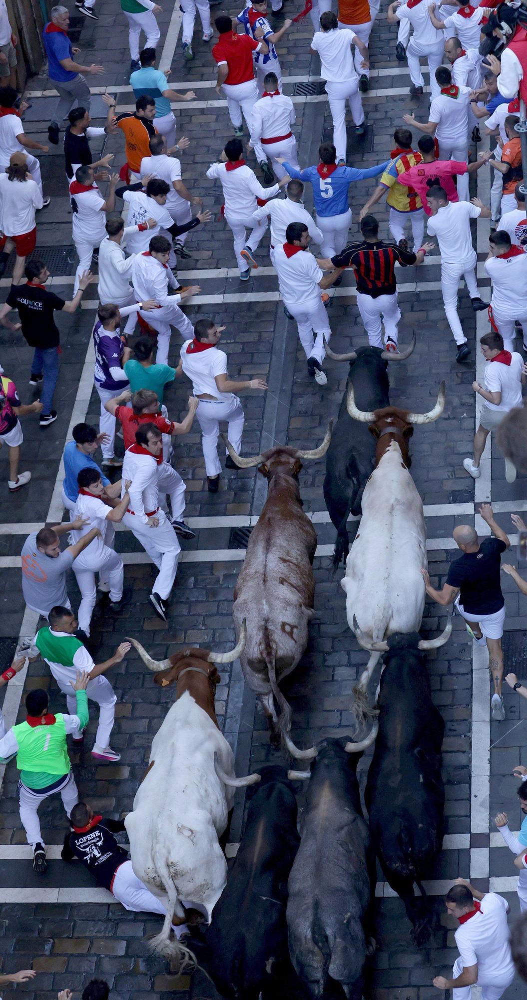 Fotos del octavo encierro de San Fermín con toros de Miura