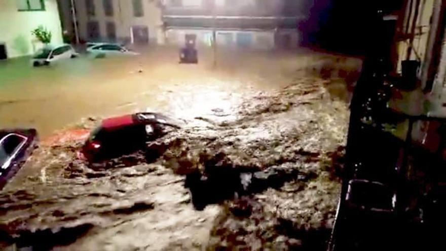 Vista de una calle de la localidad de Sant Llorenç des Cardassar (Mallorca), durante las inundaciones