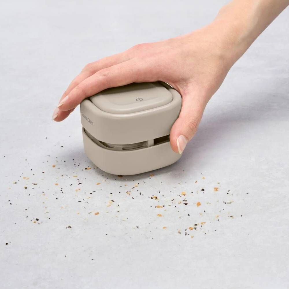 Mini aspirador de mesa