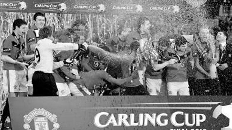 Los jugadores del Manchester United, celebrando el título.