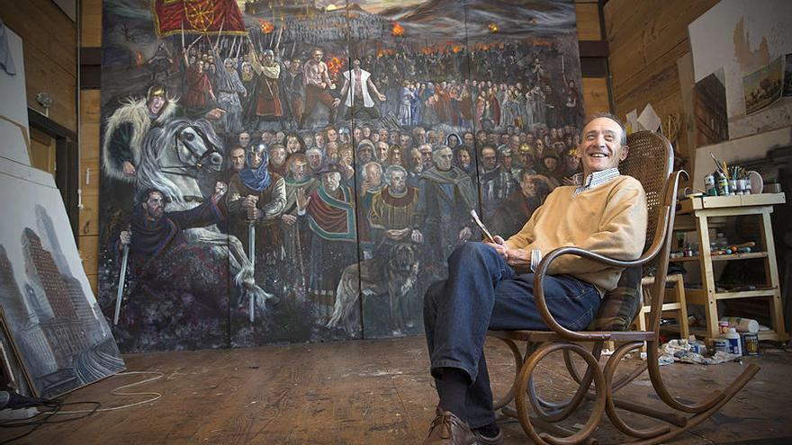 Xabier Morrás posa en su casa-estudio ante el cuadro ‘Héroes Anónimos Navarros’.