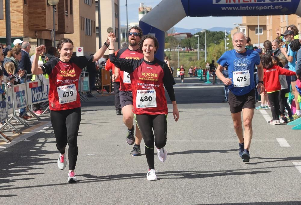 Imágenes de la carrera de Hiru Herri en Huarte este domingo