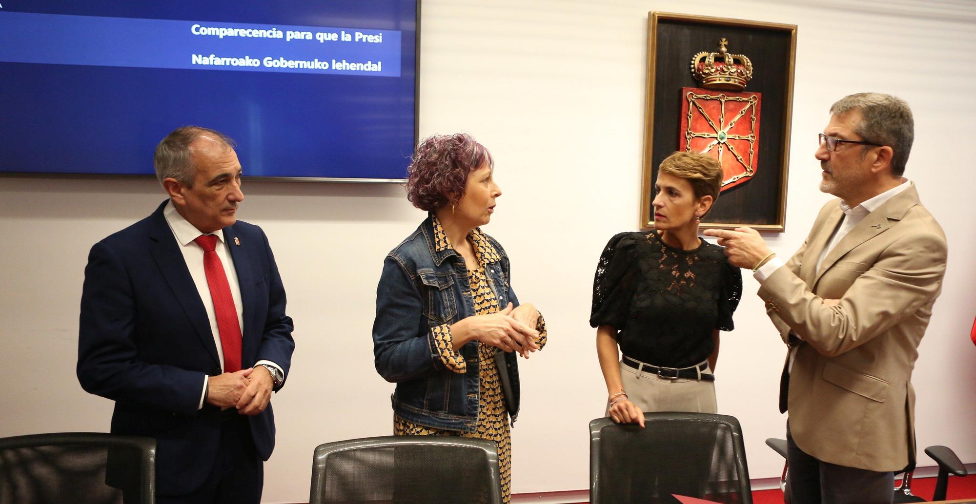 Fotos de la comparecencia de María Chivite en el Parlamento para explicar los informes de la OANA