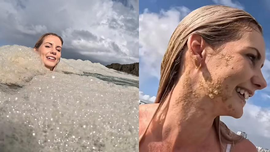 Una influencer se baña feliz entre la espuma del mar sin saber que son aguas fecales