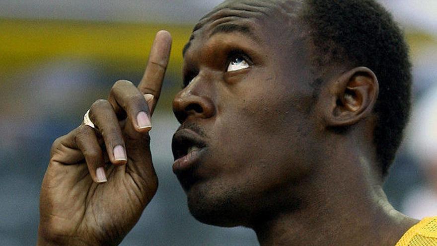 Michael Johnson considera que Usain Bolt debería pensar seriamente en pasarse a los 400 metros