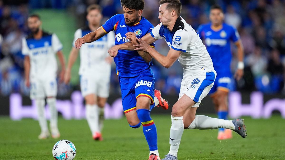 Arambarri y Pacheco en el partido de ayer