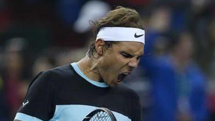 Nadal supera un maratón con Karlovic para meterse en la tercera ronda