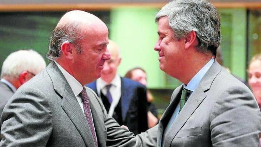 El eurogrupo elige entre De Guindos y Lane para el BCE