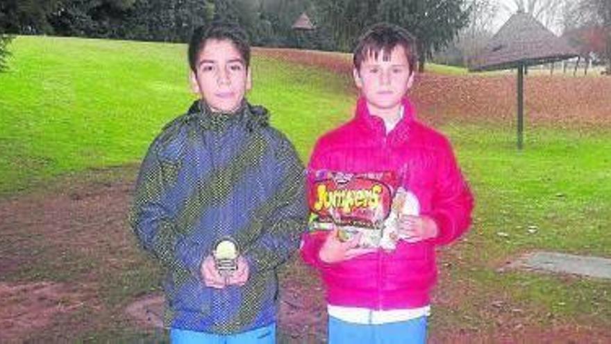 Álex Baigorria y Antonio Prat, con sus galardones.