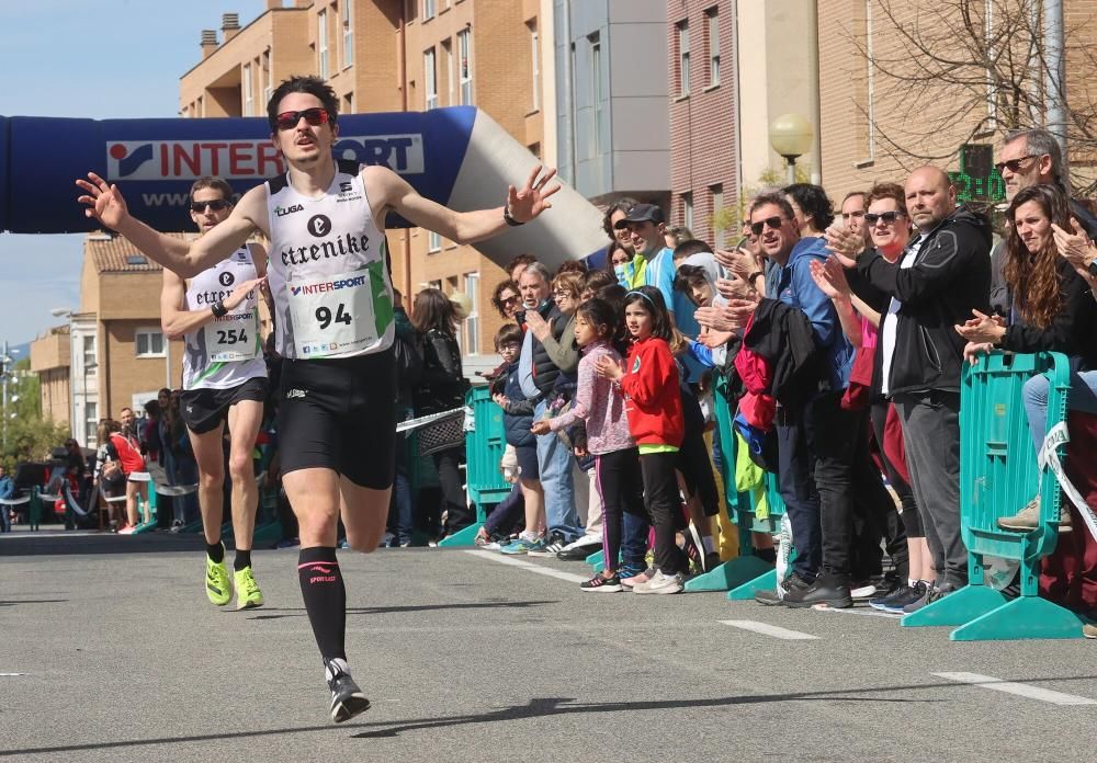 Imágenes de la carrera de Hiru Herri en Huarte este domingo