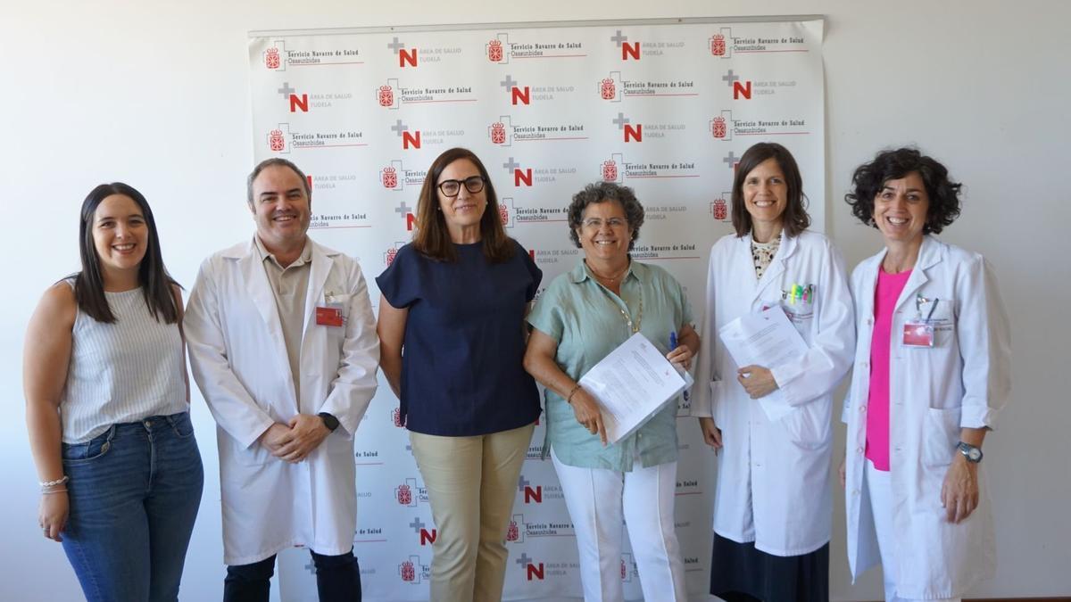 Responsables del Área de Salud y de AMIMET, ras la firma del acuerdo.