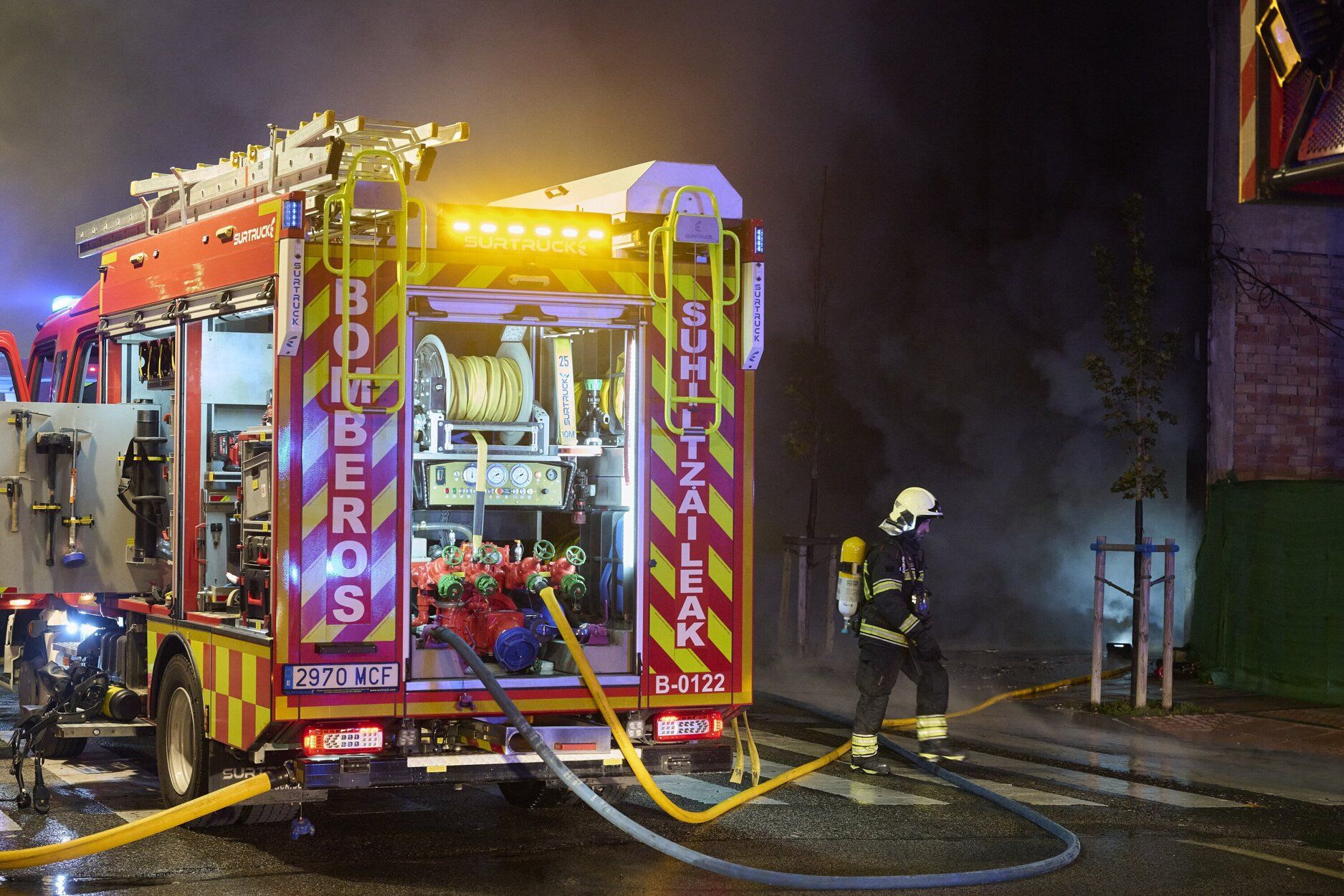Fotos del incendio de un bazar en la Rochapea