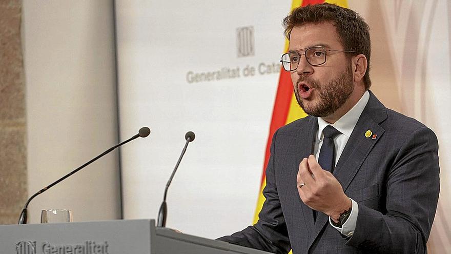 Pere Aragonès, explicando ayer el cambio de parecer de Esquerra como “precio” en su servicio a la ciudadanía catalana.  | FOTO: EFE