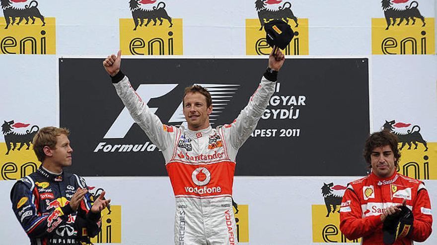 Button gana una carrera con lluvia en la que Alonso fue tercero