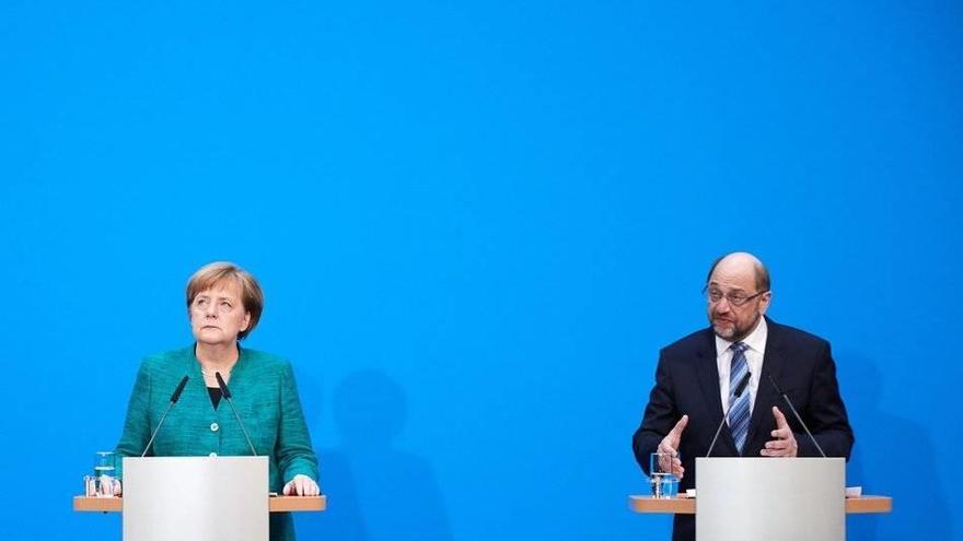 Angela Merkel (CDU) y Martin Schulz (SPD) anuncian en 2018 el pacto de Gran Coalición en Alemania. Angela Merkel (CDU) y Martin Schulz (SPD) anuncian en 2018 el pacto de Gran Coalición en Alemania.