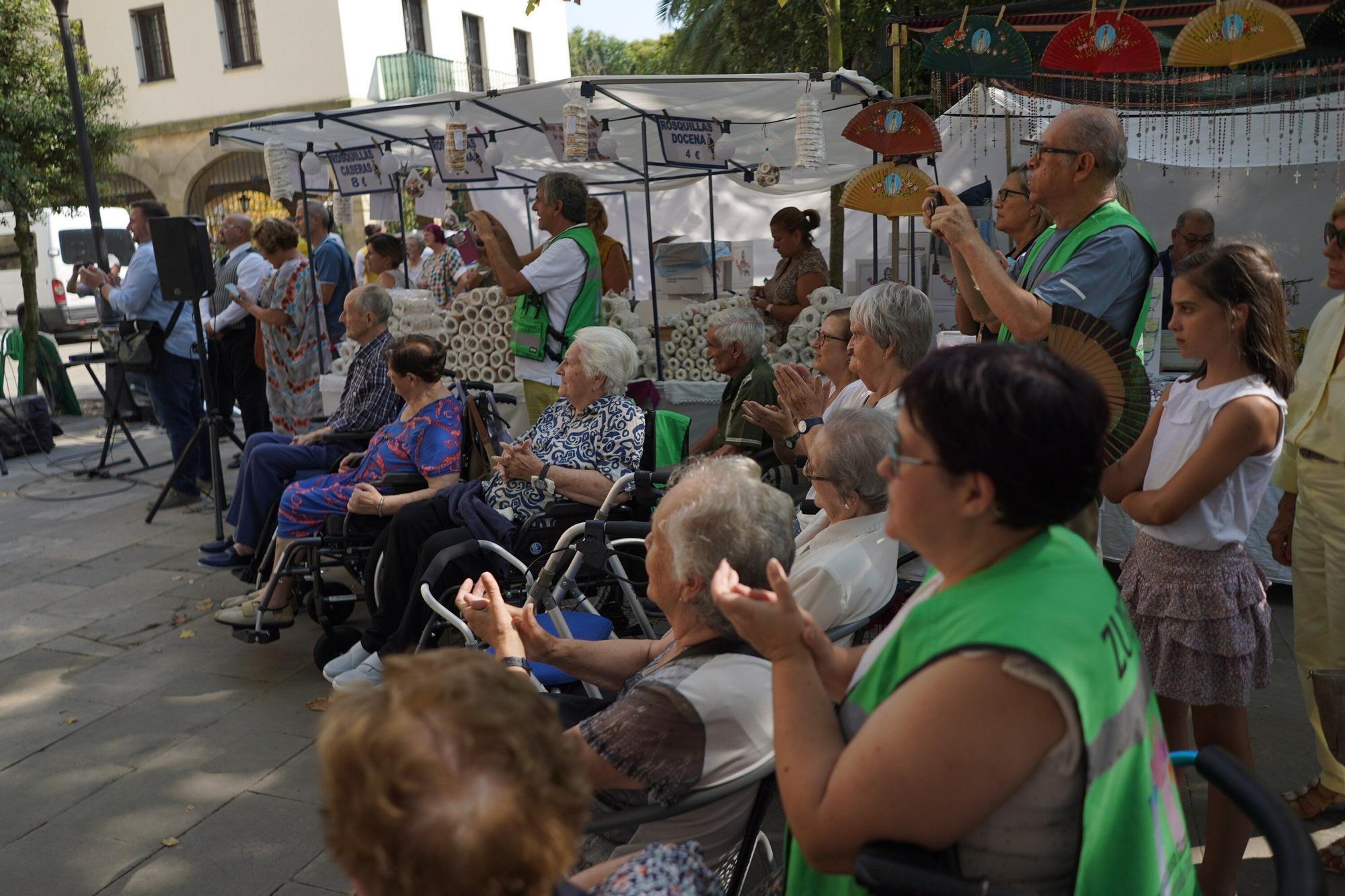 En imágenes: La apertura oficial de las barracas y la ofrenda floral a la Amatxu de Begoña por parte de los circenses