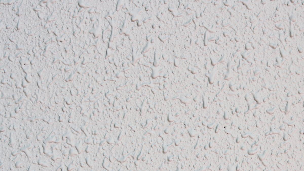 Pared pintada con gotelé blanco. Pared pintada con gotelé blanco.