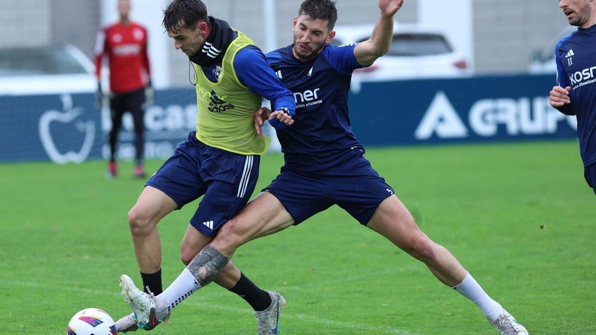 Aimar Oroz y David García, en el entrenamiento del miércoles.