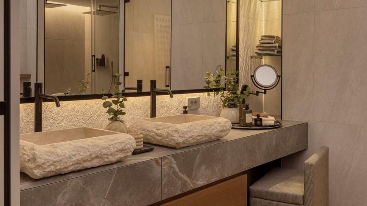 Doble lavabo rectangular de mármol.