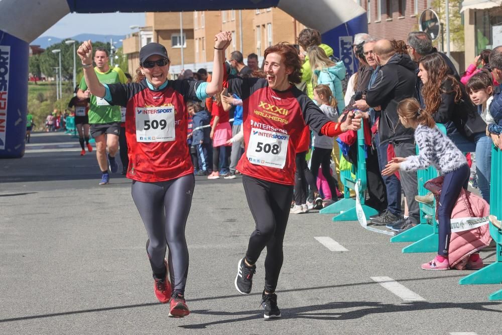 Imágenes de la carrera de Hiru Herri en Huarte este domingo