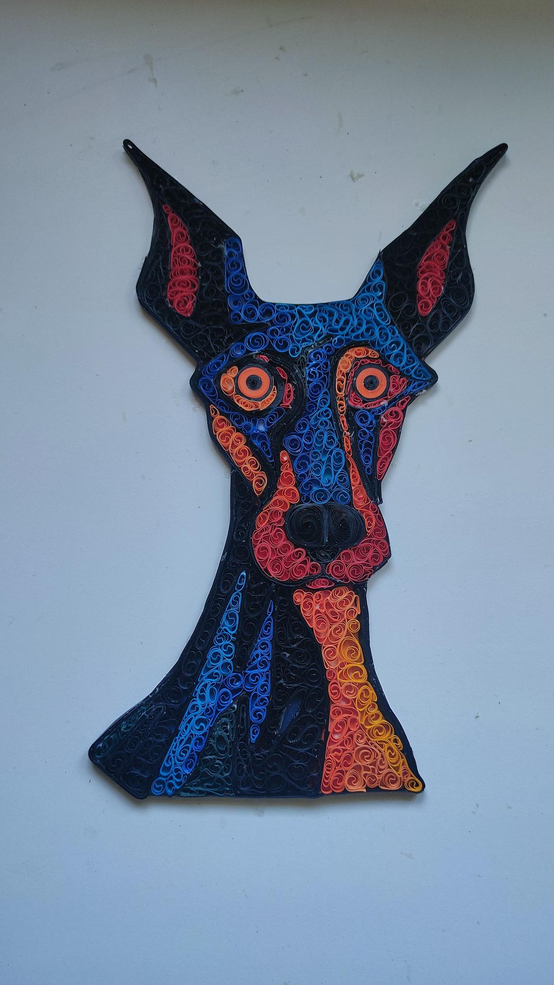 El cuadro de un doberman relleno.